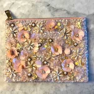 ASOS zippered clutch with sequins and pearl flower details